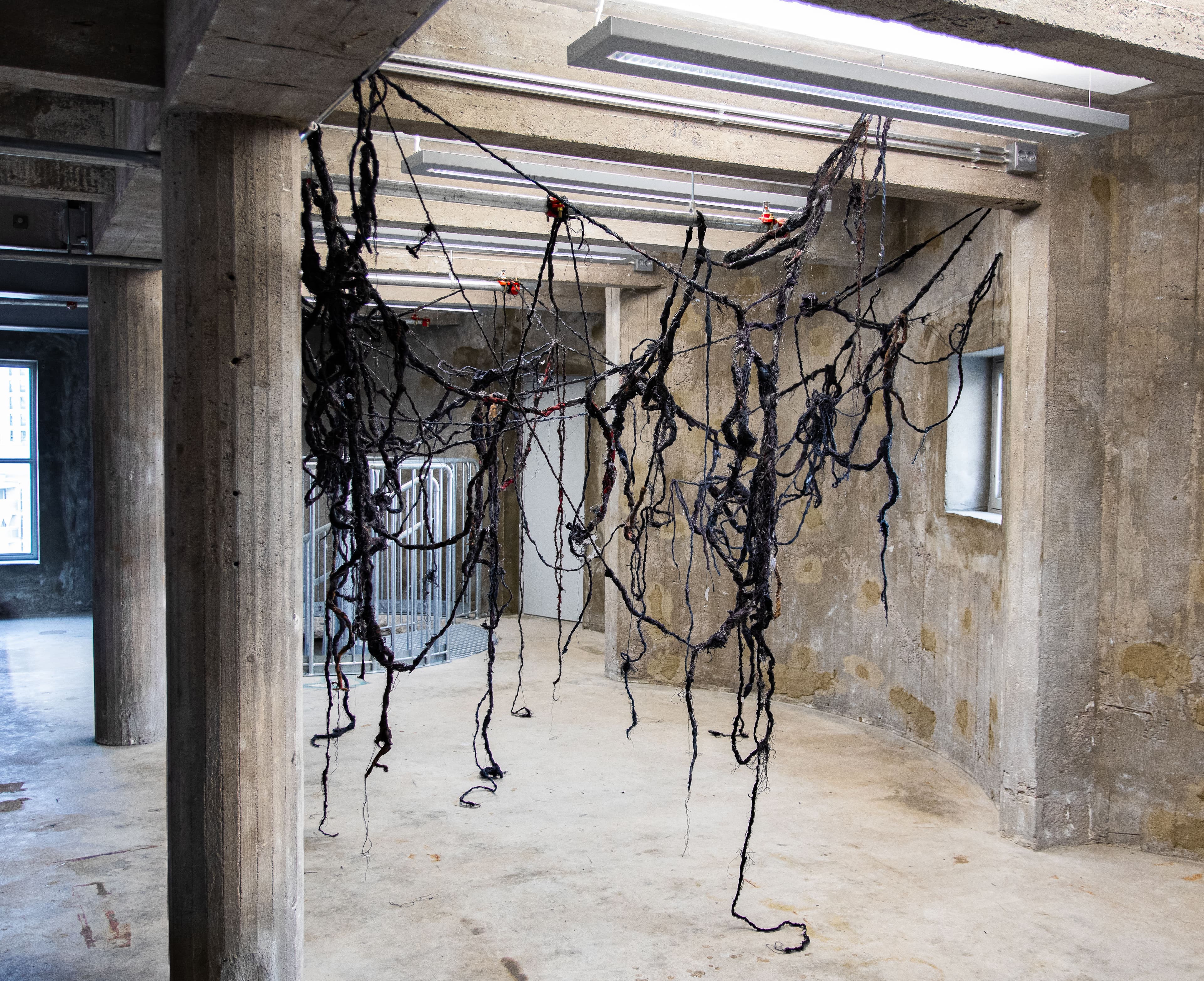 A textile artwork in an industrial space
